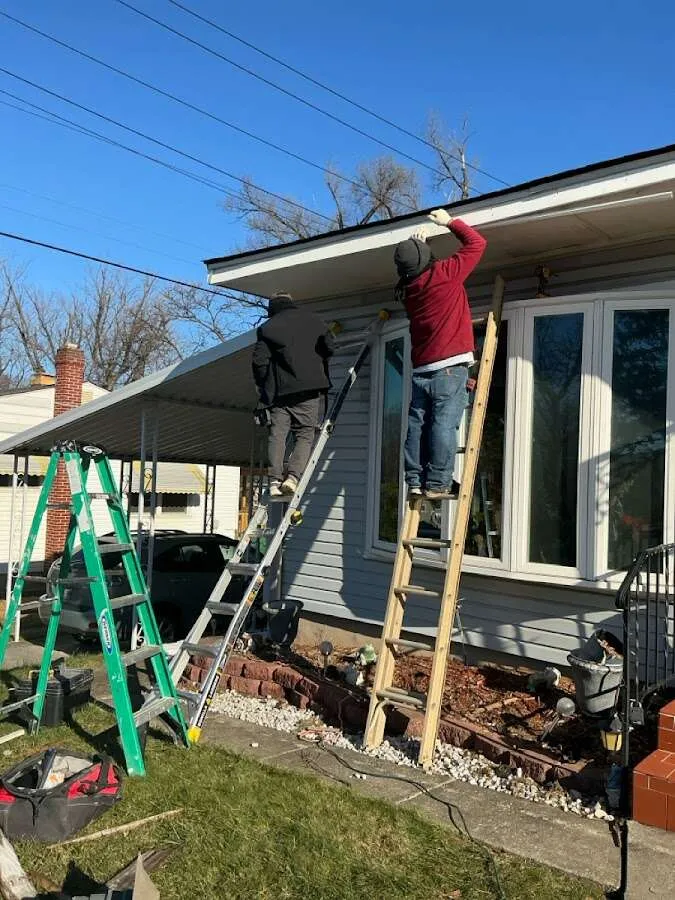 Restoration crew performing exterior repair in Waupaca