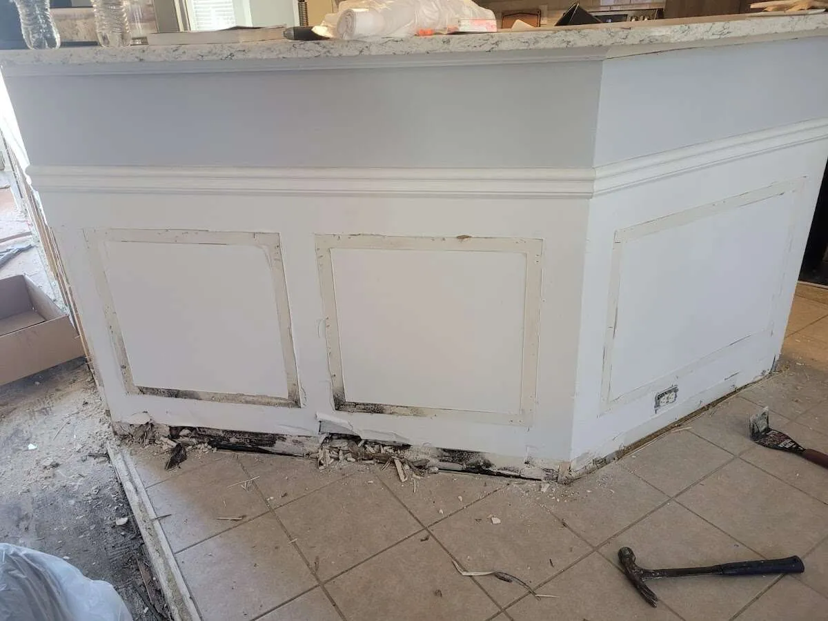 Water damage and mold on kitchen during Storm Damage Restoration in Waupaca